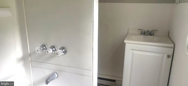 a bathroom with a bathtub