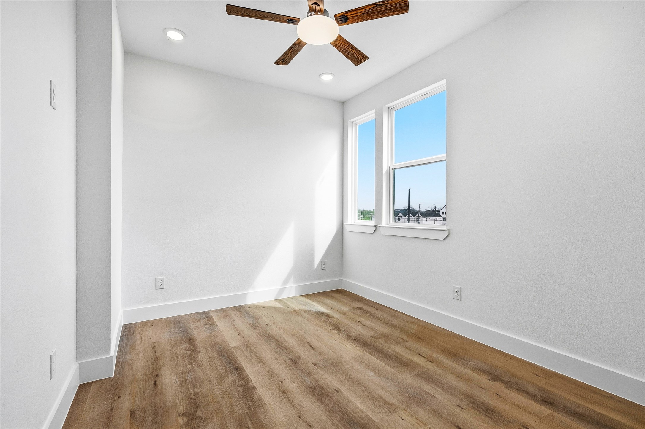 4209 Allston Street Houston, TX 77018 - Photo 20 of 31 an empty room with a window and ceiling fan