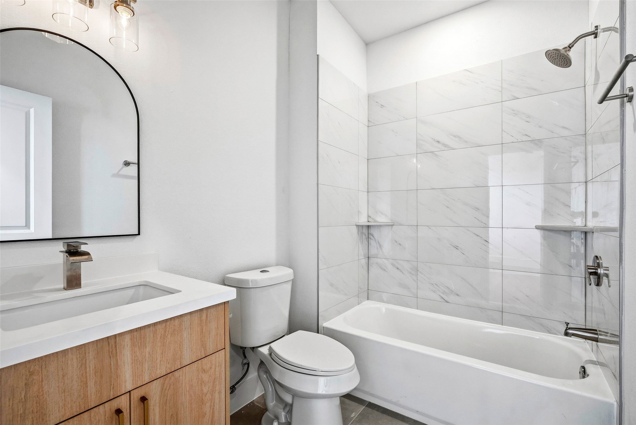 4209 Allston Street Houston, TX 77018 - Photo 21 of 31 a bathroom with a sink a toilet and a bathtub