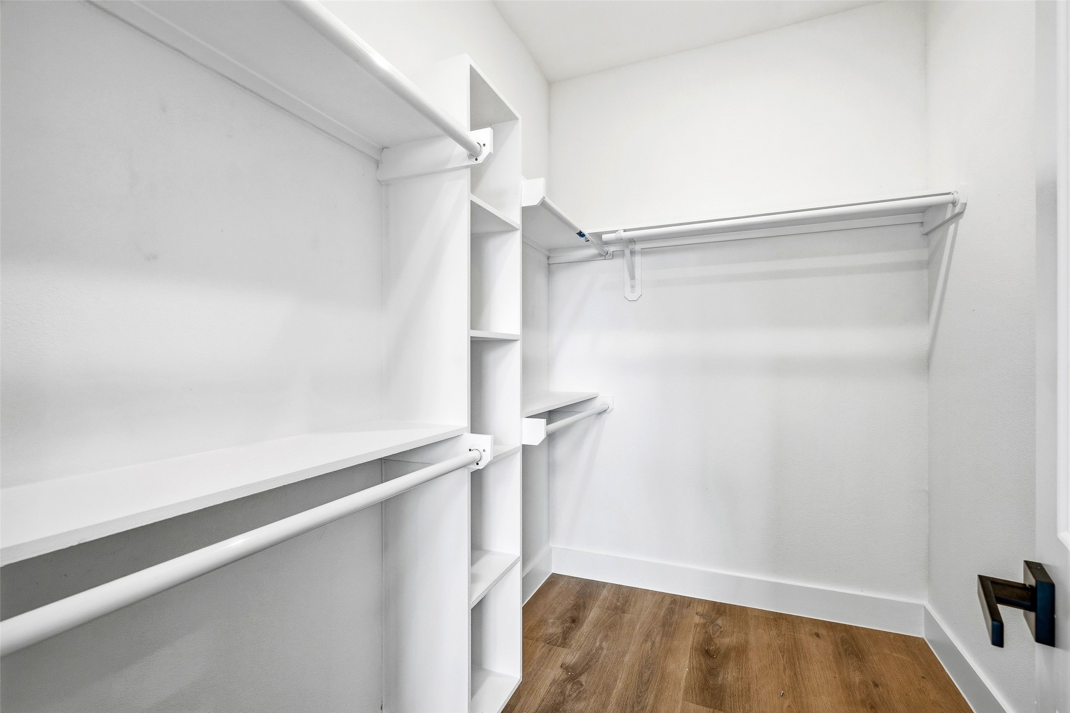 4209 Allston Street Houston, TX 77018 - Photo 24 of 31 a view of walk in closet with empty racks