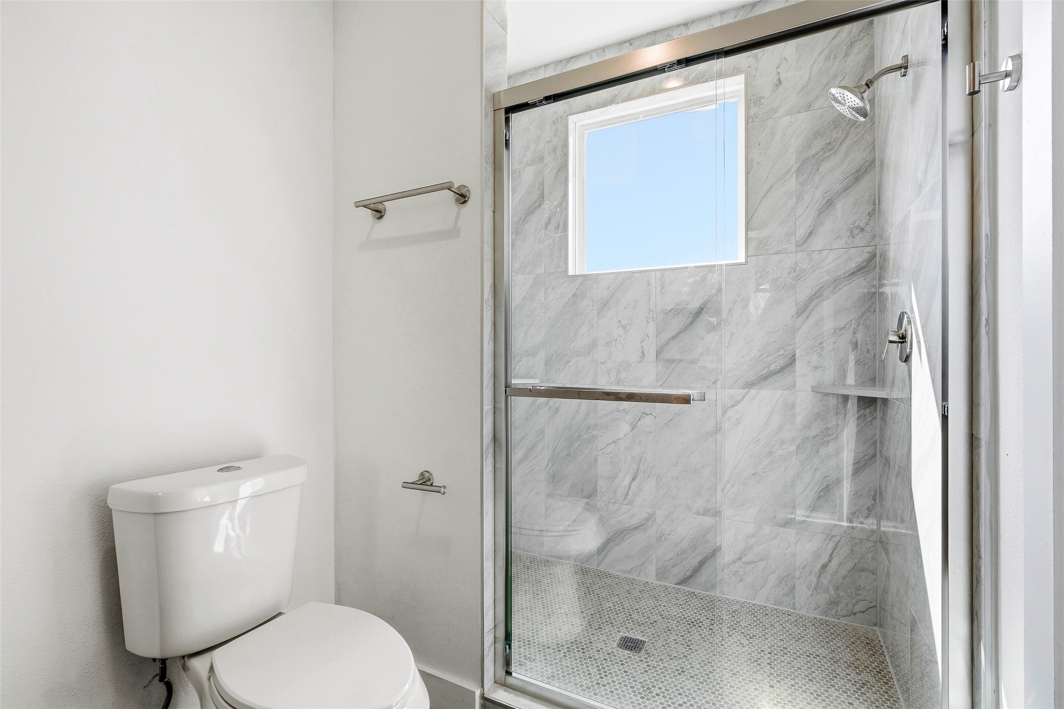 4209 Allston Street Houston, TX 77018 - Photo 25 of 31 a bathroom with a toilet and a shower