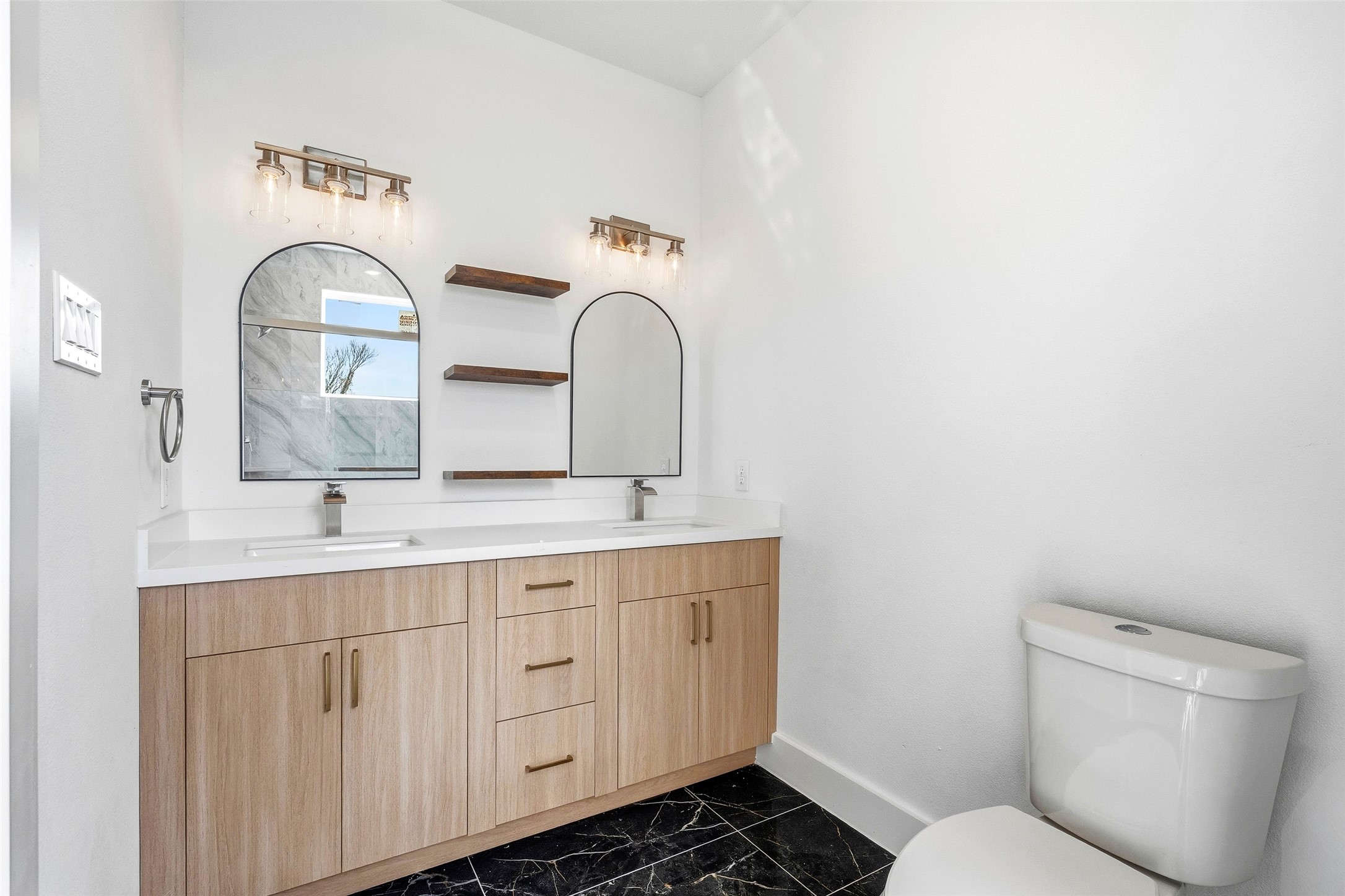 4209 Allston Street Houston, TX 77018 - Photo 26 of 31 a bathroom with a toilet sink and mirror