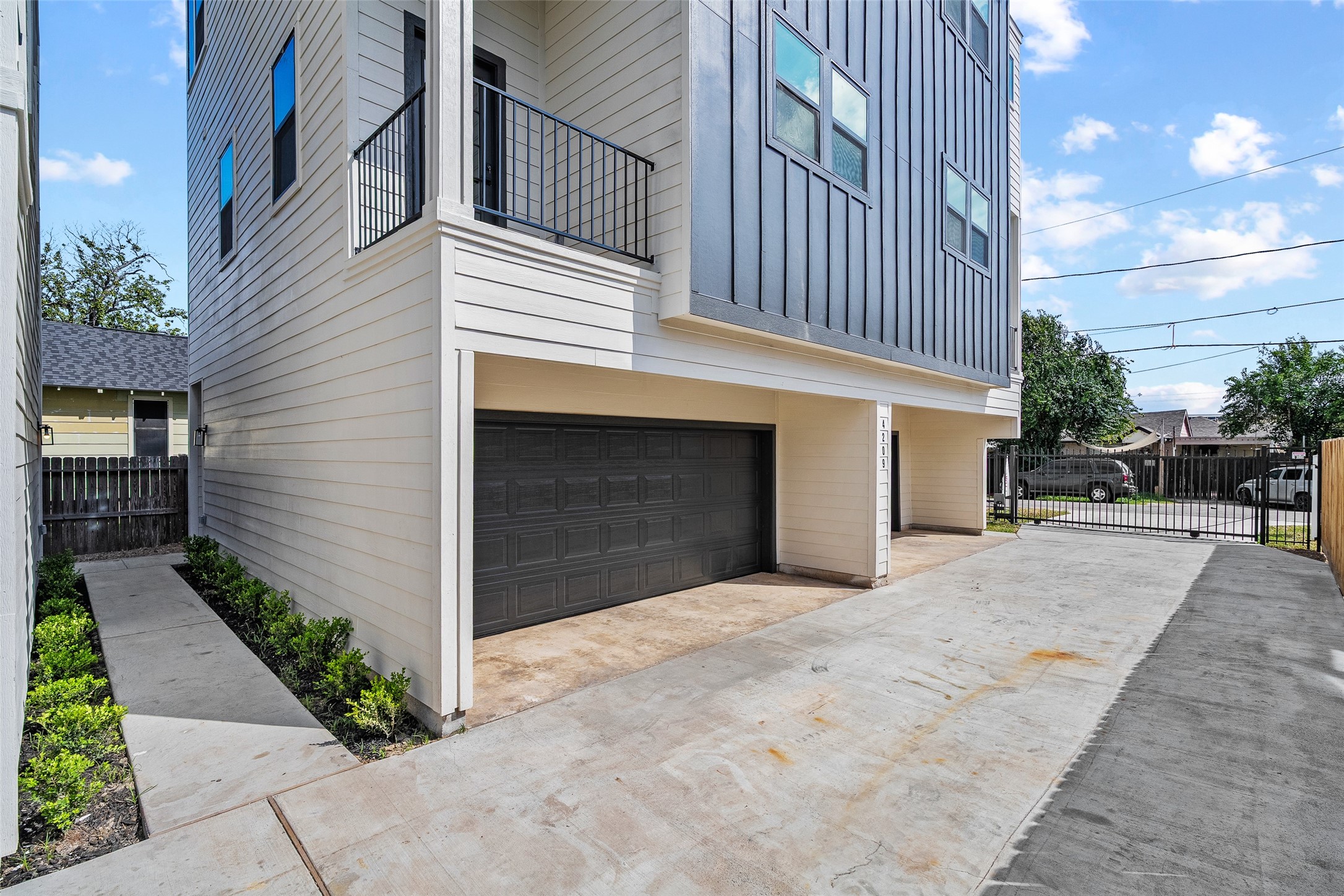 4209 Allston Street Houston, TX 77018 - Photo 5 of 31 a view of a house with a yard and garage
