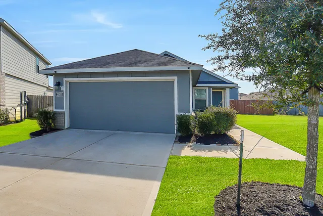 a view of backyard of a house