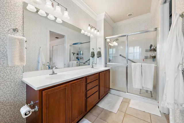 a bathroom with a sink vanity and a mirror