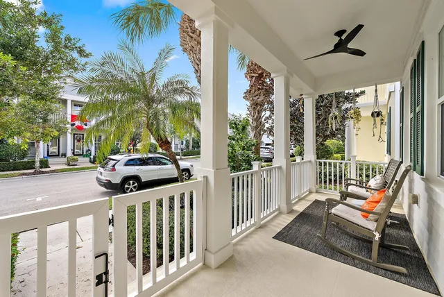 a view of a patio with a table and chairs