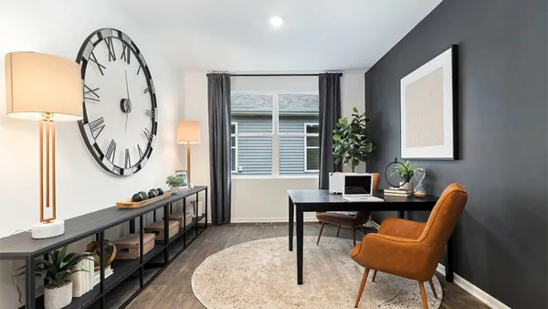a view of a livingroom with furniture