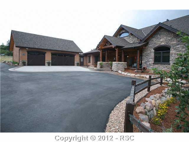 With 3-stall Garage