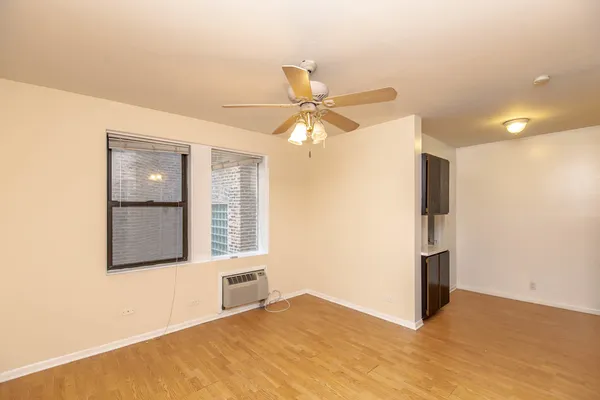 a view of an empty room with a window