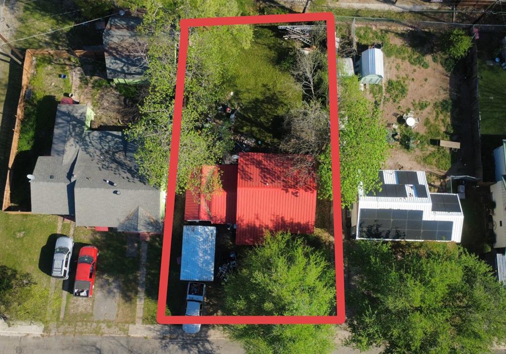 an aerial view of houses and roads