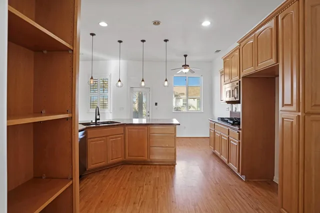 a view of a dining room with furniture window and flowerpot