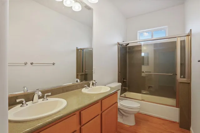 a view of a workspace with furniture