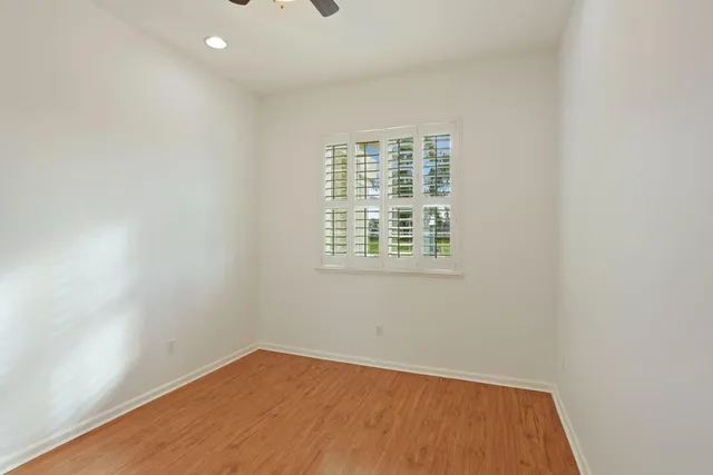 a view of a patio with couches and potted plants