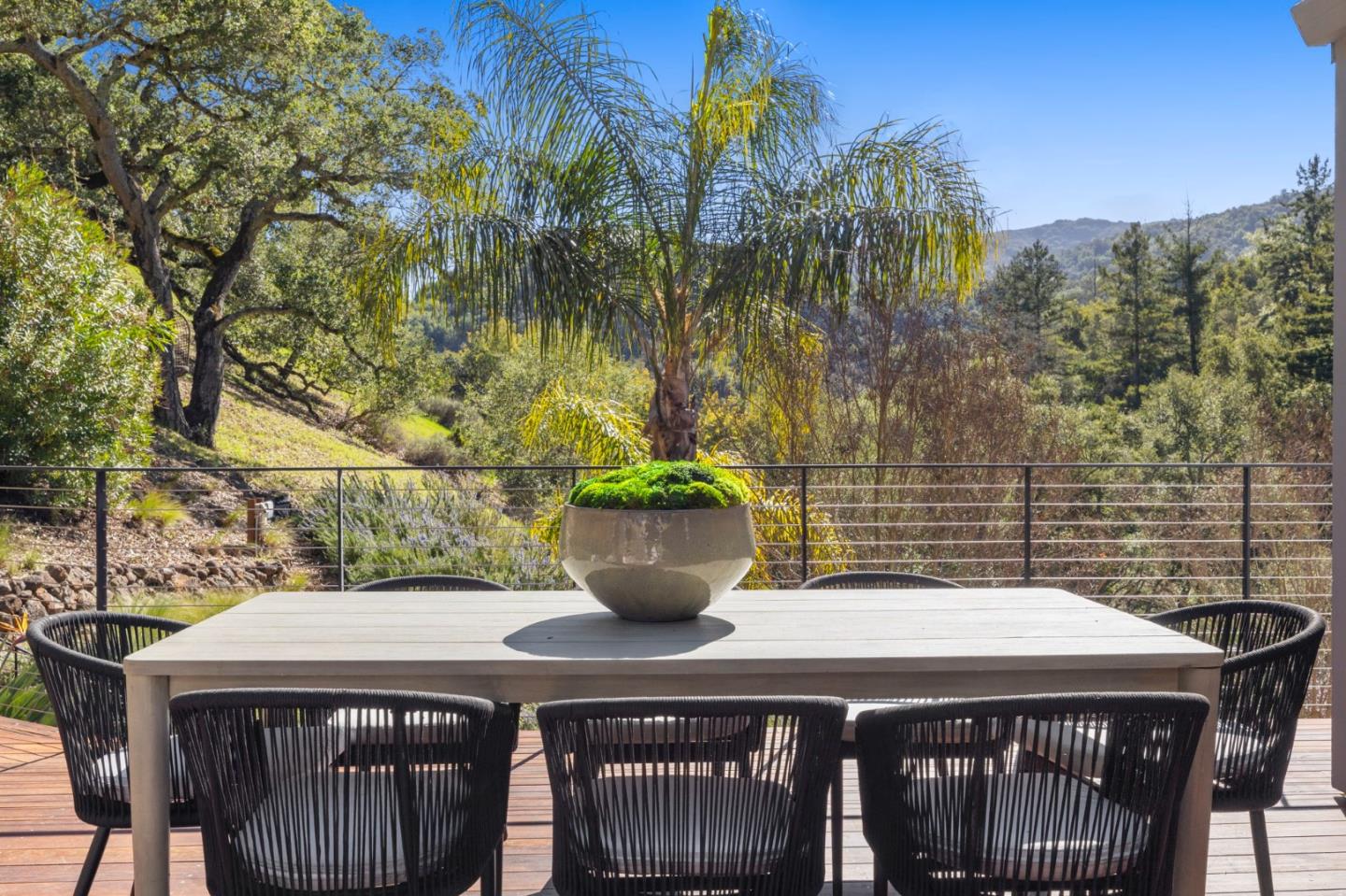 27201 Moody Road Los Altos Hills, CA 94022 - Photo 19 of 43 a view of a patio with table and chairs and potted plants