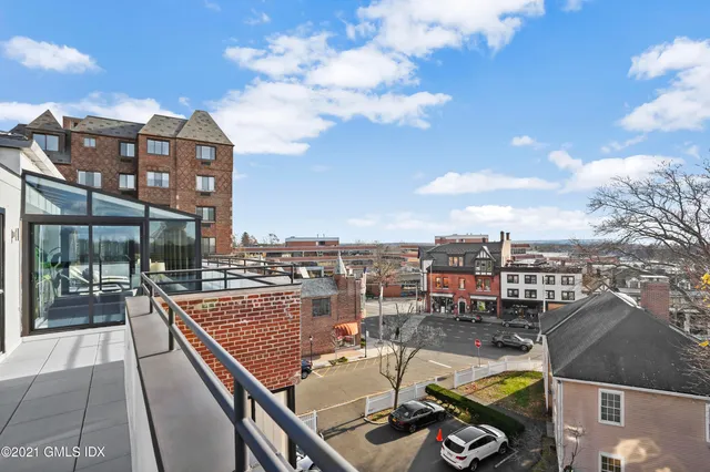 a view of a balcony with city view