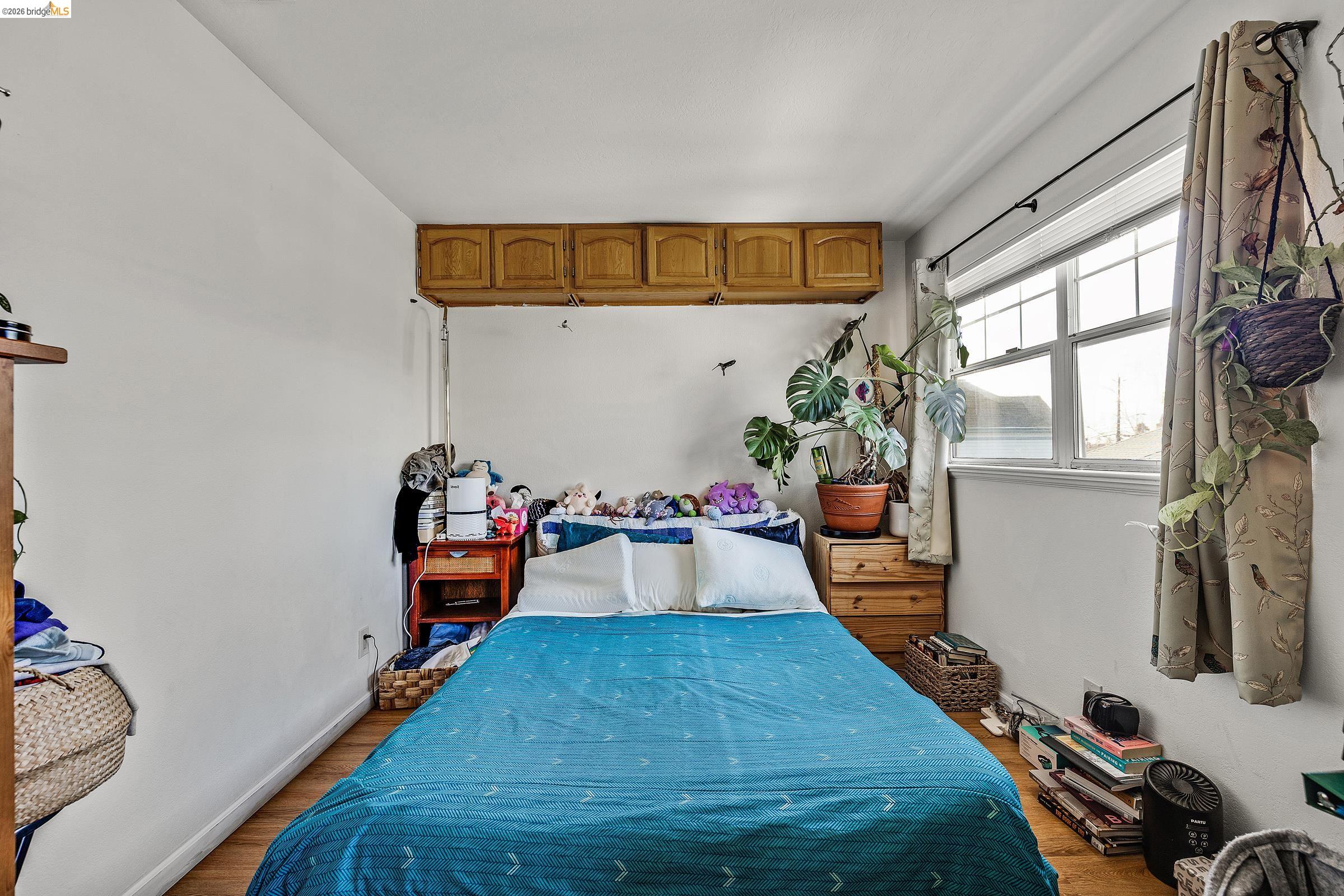 976 Park Street Alameda, CA 94501 - Photo 36 of 36 a room with musical instruments and wooden floor