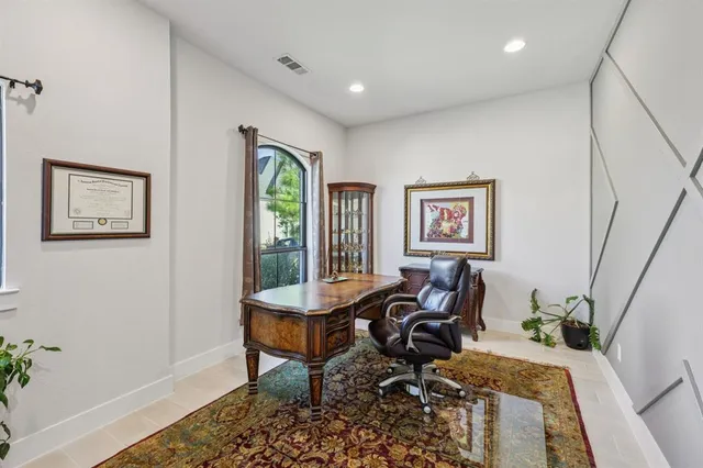 a workspace with furniture and window