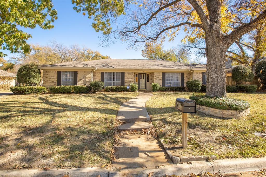 2915 South Fielder Road Arlington, TX 76015 - Photo 1 of 1 a front view of a house with a yard