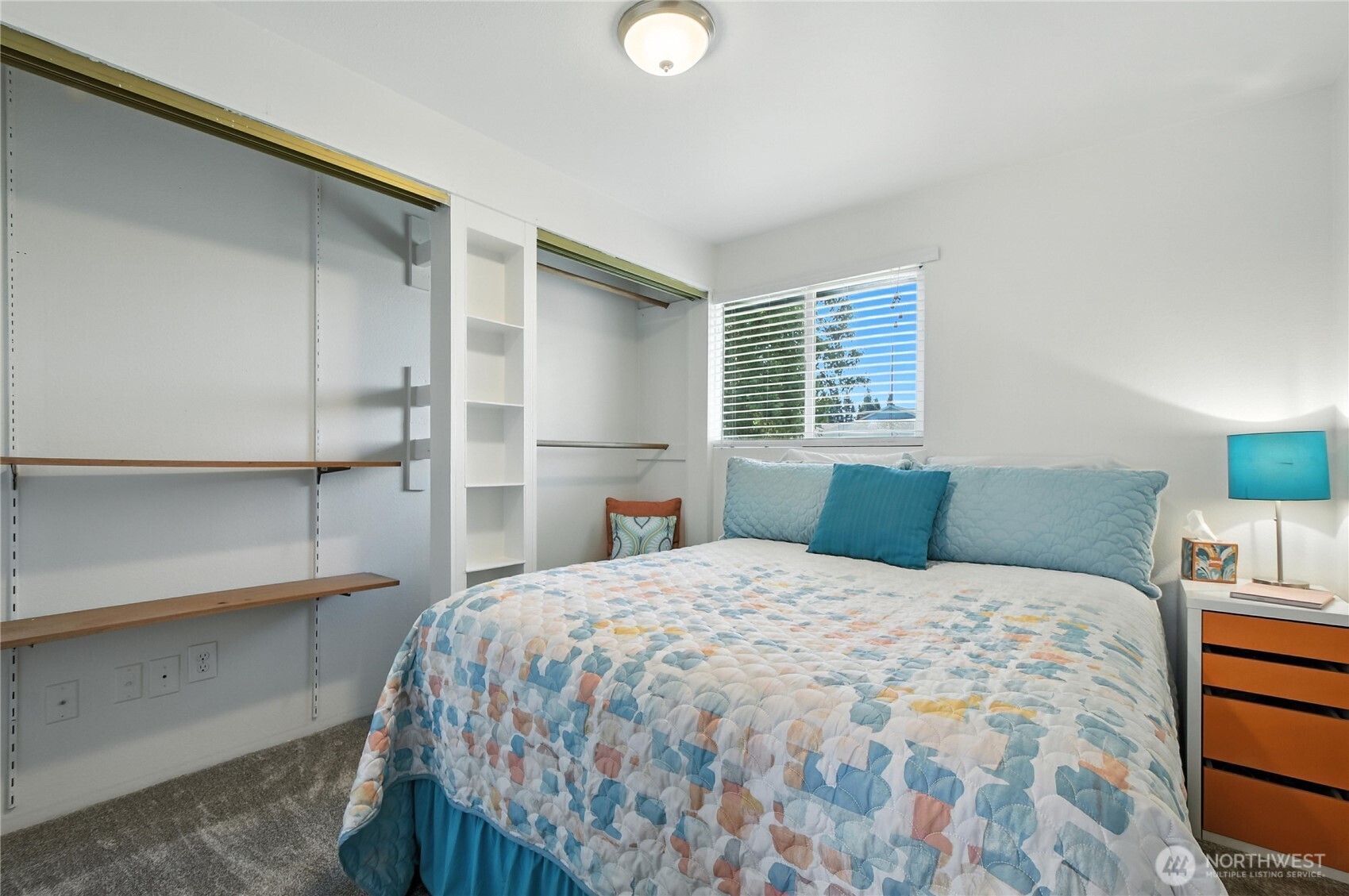 2102 35th Avenue Longview, WA 98632 - Photo 20 of 31 a bedroom with a bed and a lamp on dresser