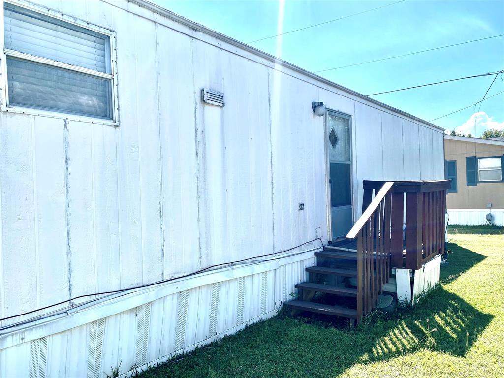 100 South Beltline Road, Unit 79 Dallas, TX 75253 - Photo 15 of 15 a view of entryway with wooden walls and stairs