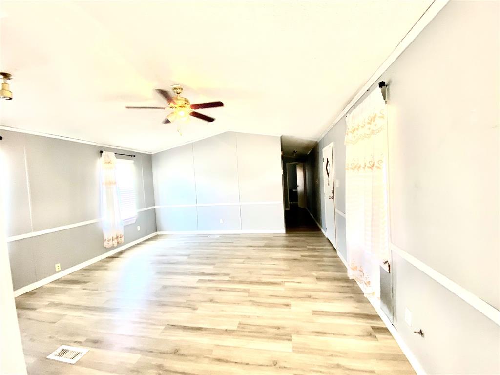 100 South Beltline Road, Unit 79 Dallas, TX 75253 - Photo 4 of 15 a view of a room with a ceiling fan