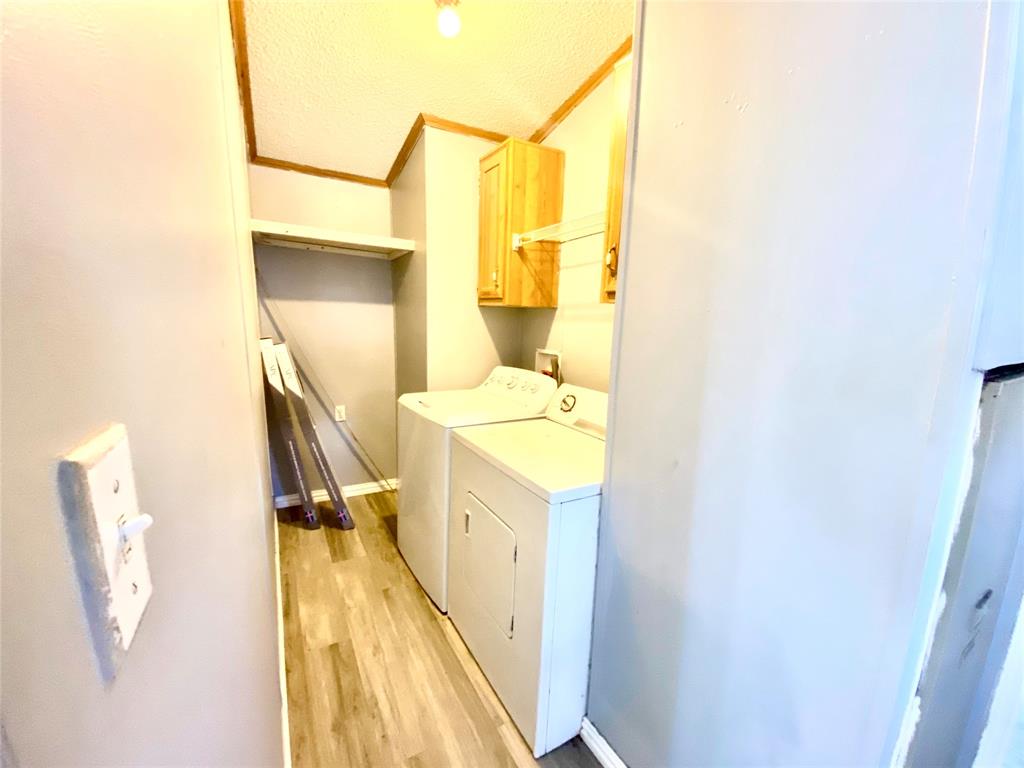 100 South Beltline Road, Unit 79 Dallas, TX 75253 - Photo 8 of 15 a utility room with a sink a washer and dryer