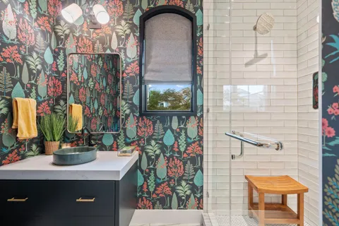 a bathroom with a sink and a mirror