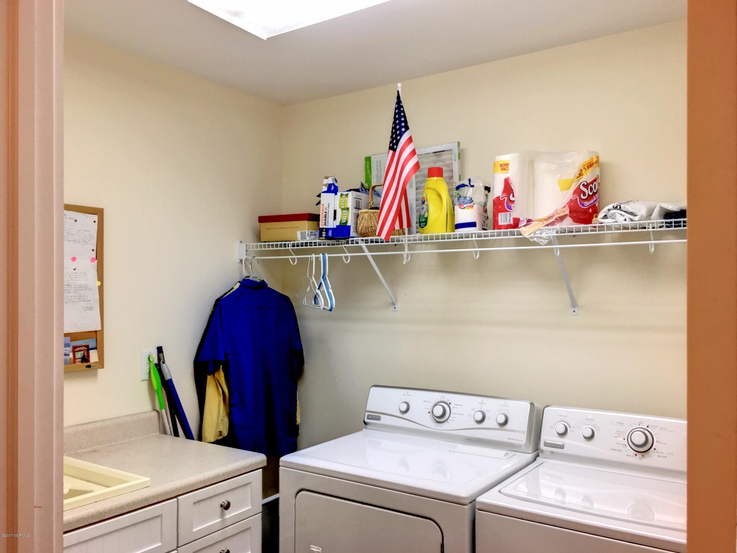 1007 Cordgrass Road Hampstead, NC 28443 - Photo 31 of 31 Laundry with Sink