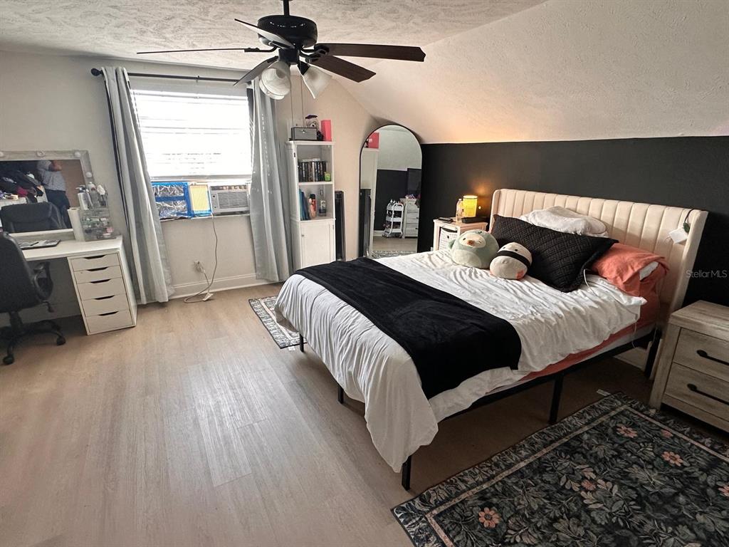 613 Royal Crest Way Brandon, FL 33511 - Photo 23 of 50 a bedroom with a bed and a mirror