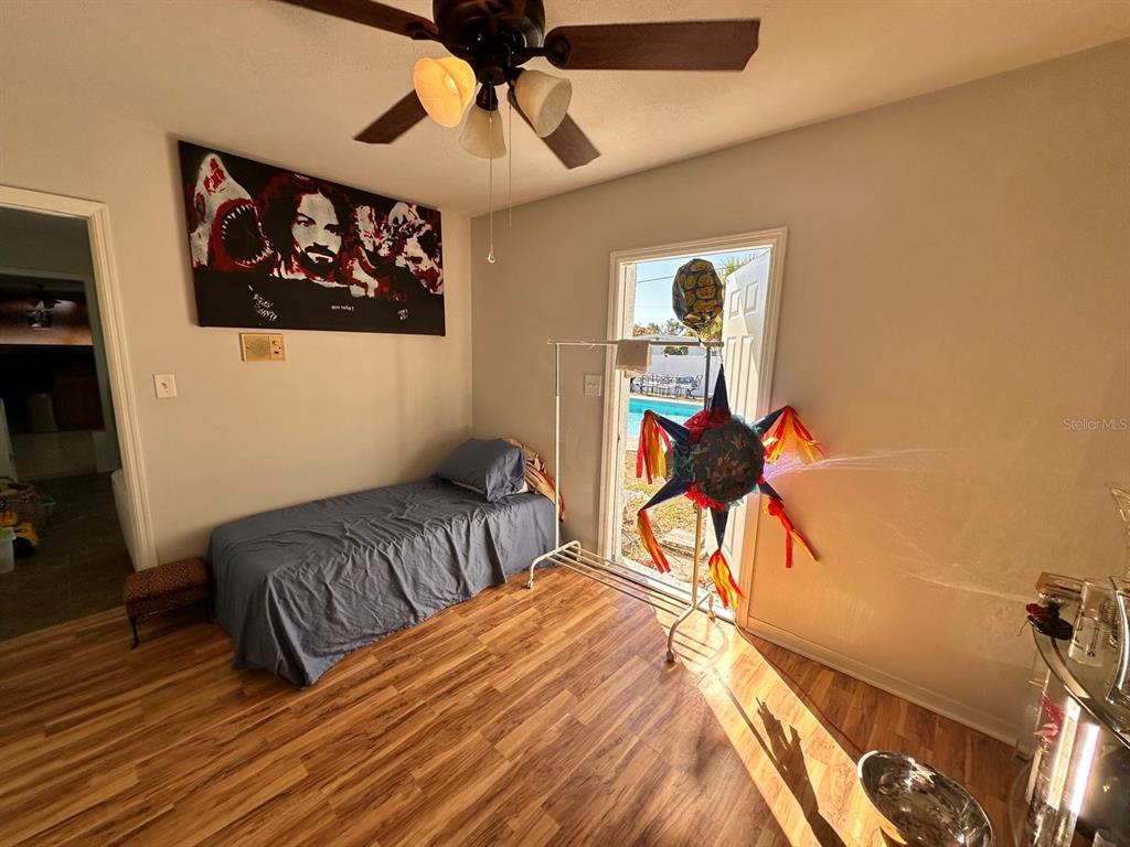 613 Royal Crest Way Brandon, FL 33511 - Photo 25 of 50 a bedroom with bed and wooden floor