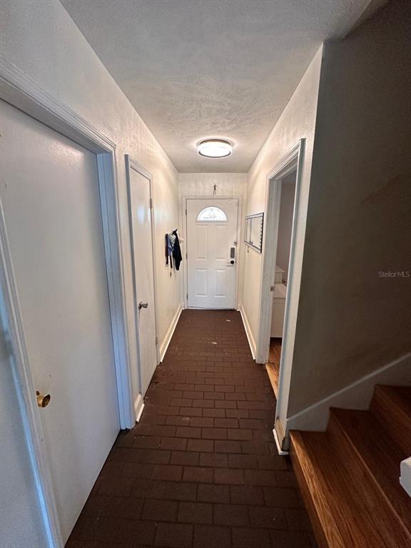 613 Royal Crest Way Brandon, FL 33511 - Photo 3 of 50 a view of a hallway with windows