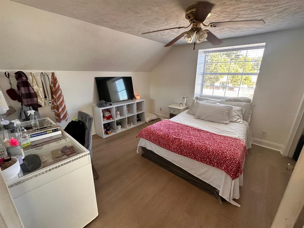 613 Royal Crest Way Brandon, FL 33511 - Photo 46 of 50 a bedroom with bed and a window