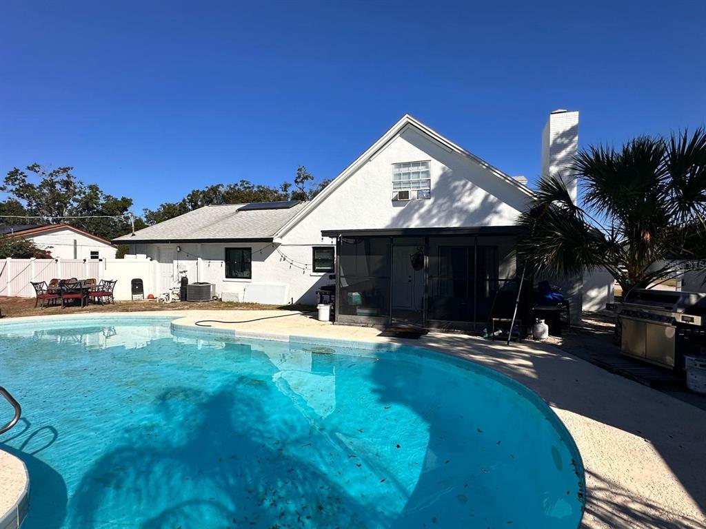 613 Royal Crest Way Brandon, FL 33511 - Photo 47 of 50 a view of a house with swimming pool and sitting area