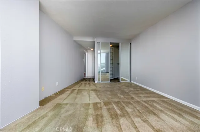 a view of an empty room and window