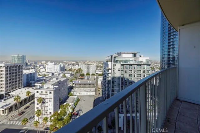 a view of a balcony with city view