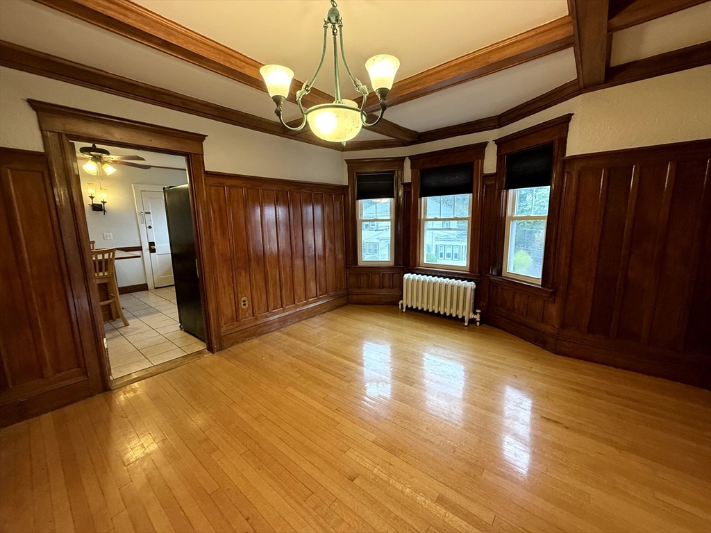 4 Adams Avenue, Unit 2 Watertown, MA 02472 - Photo 2 of 32 a view of livingroom with hardwood floor and ceiling fan
