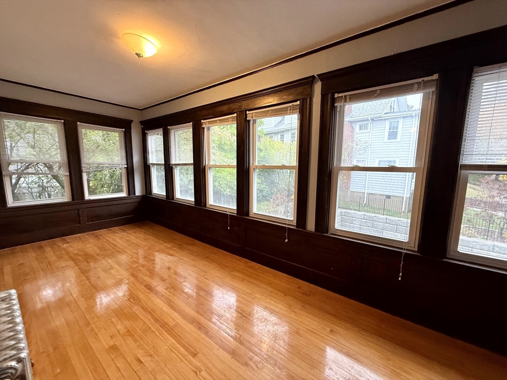 4 Adams Avenue, Unit 2 Watertown, MA 02472 - Photo 21 of 32 a view of an empty room with windows