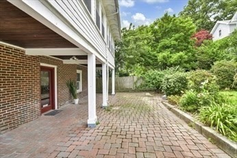 4 Adams Avenue, Unit 2 Watertown, MA 02472 - Photo 29 of 32 a view of a pathway both side of house