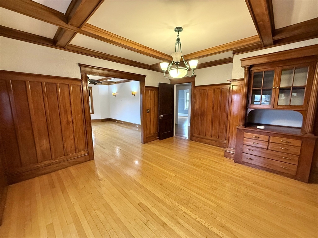 4 Adams Avenue, Unit 2 Watertown, MA 02472 - Photo 3 of 32 a view of a room with wooden floor