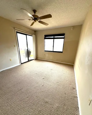 a view of a room with a window