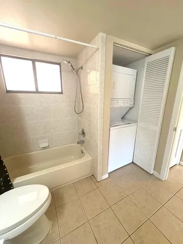 a view of chair and table in balcony