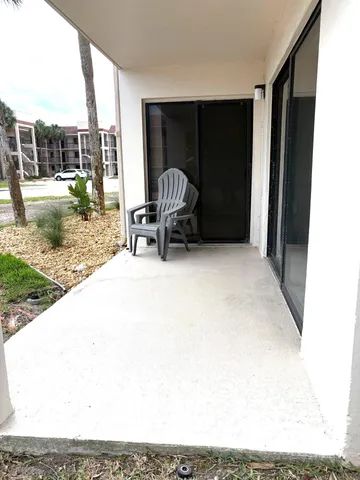 a view of a room with a large window