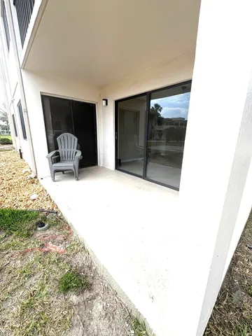 a view of water with palm trees