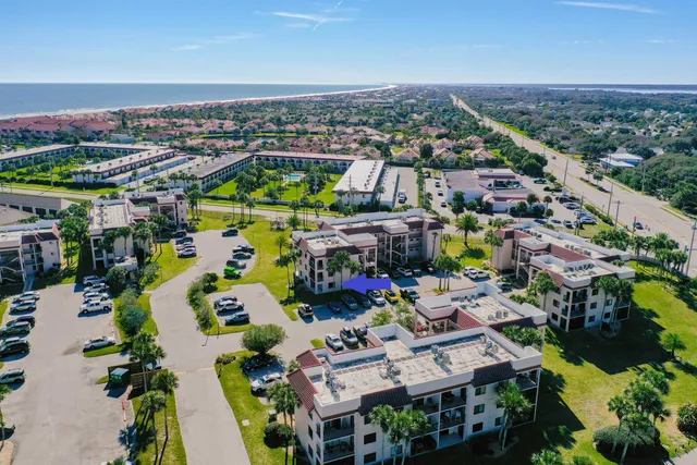 an aerial view of a houses with outdoor space