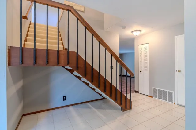 a view of an entryway with staircase