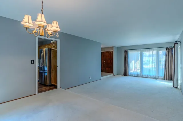 a view of a livingroom with a chandelier