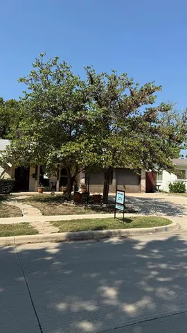 a view of a swimming pool with an outdoor seating