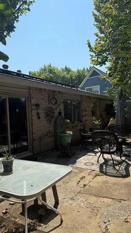 a view of backyard with outdoor space