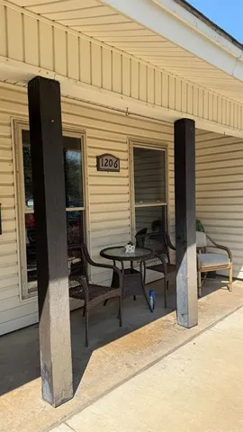 a view of a house with patio