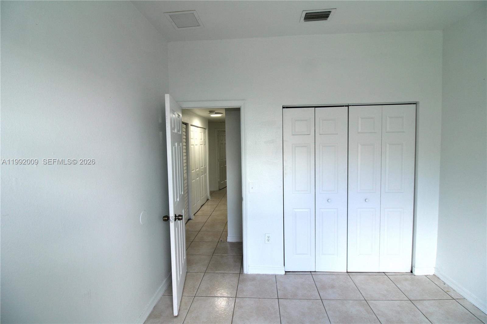 13929 Southwest 282nd Street Homestead, FL 33033 - Photo 13 of 30 a view of an empty room